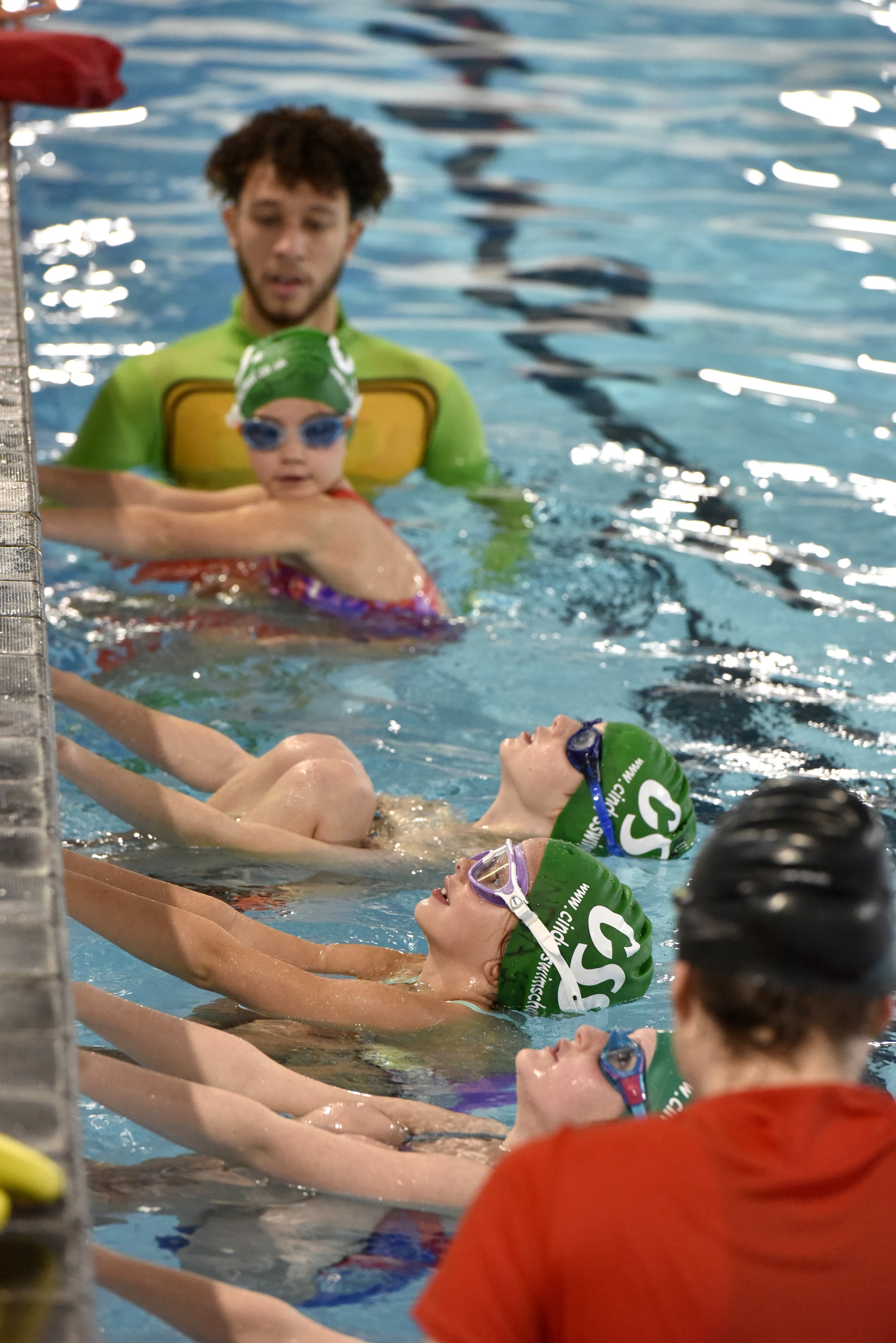 Cindys Swim School Gala - girls lined up to race parent and baby swim