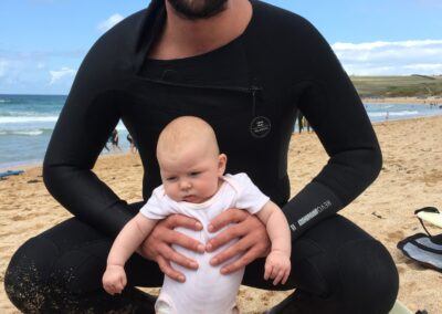 Baby with Daddy on the beach